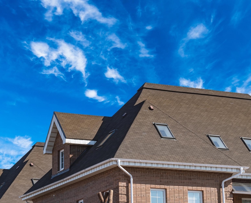 Home Roof Against Blue Sky