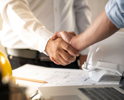 Close Up Of Two People Shaking Hands